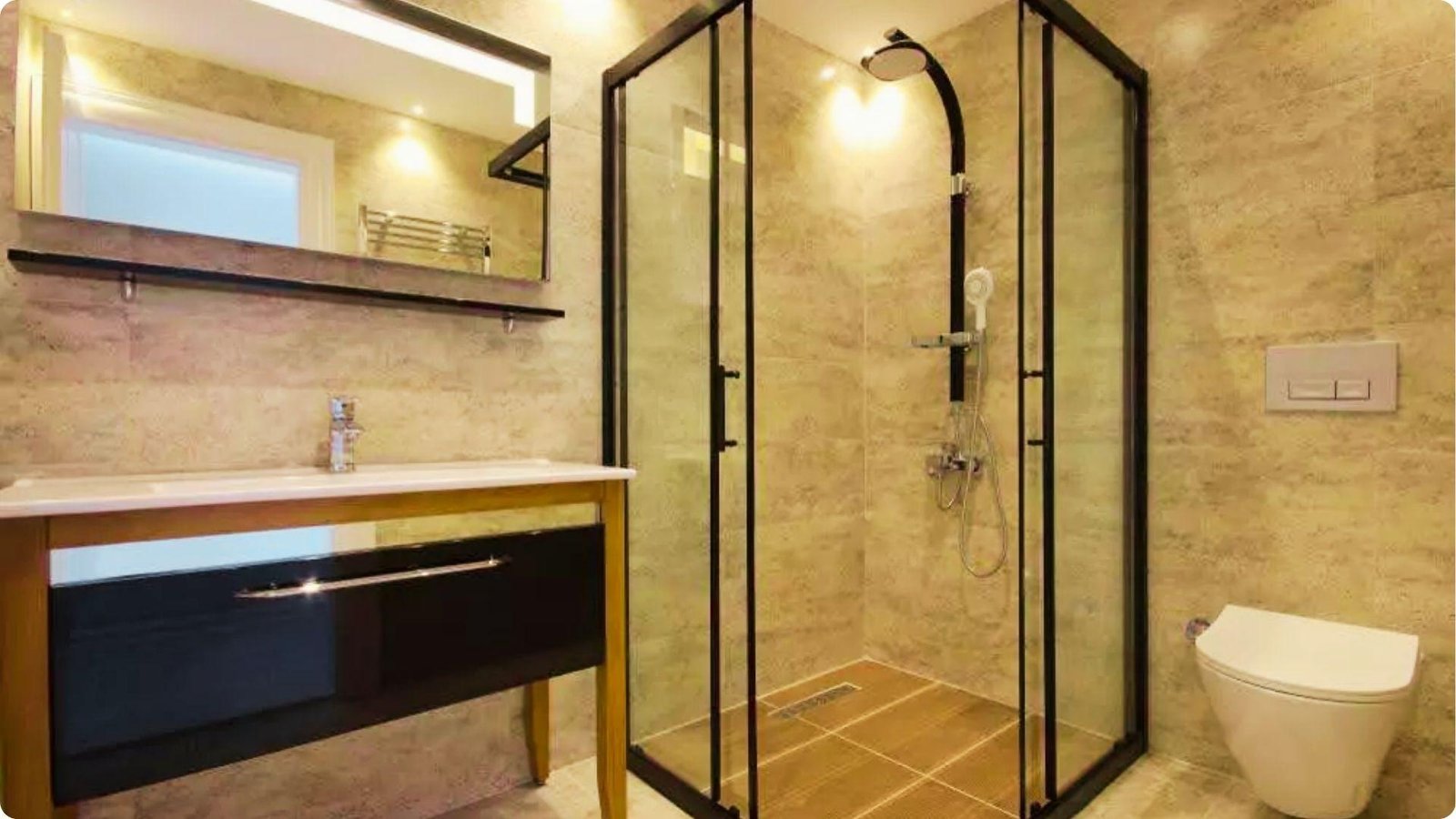 Modern bathroom with a black-framed semi frameless sliding shower door in a corner unit.
