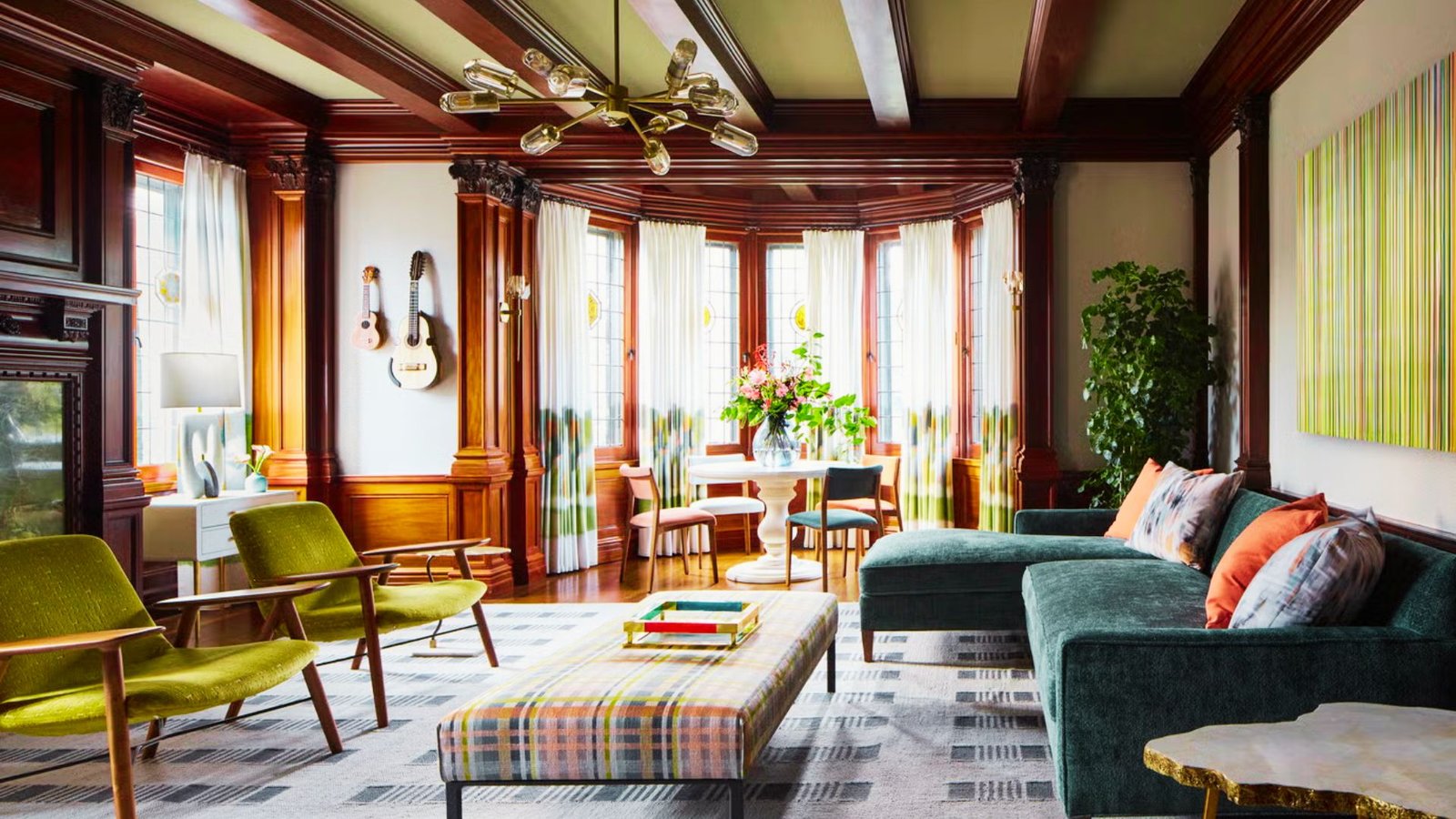 Living room with soft textures including pillows, rugs, and blankets.