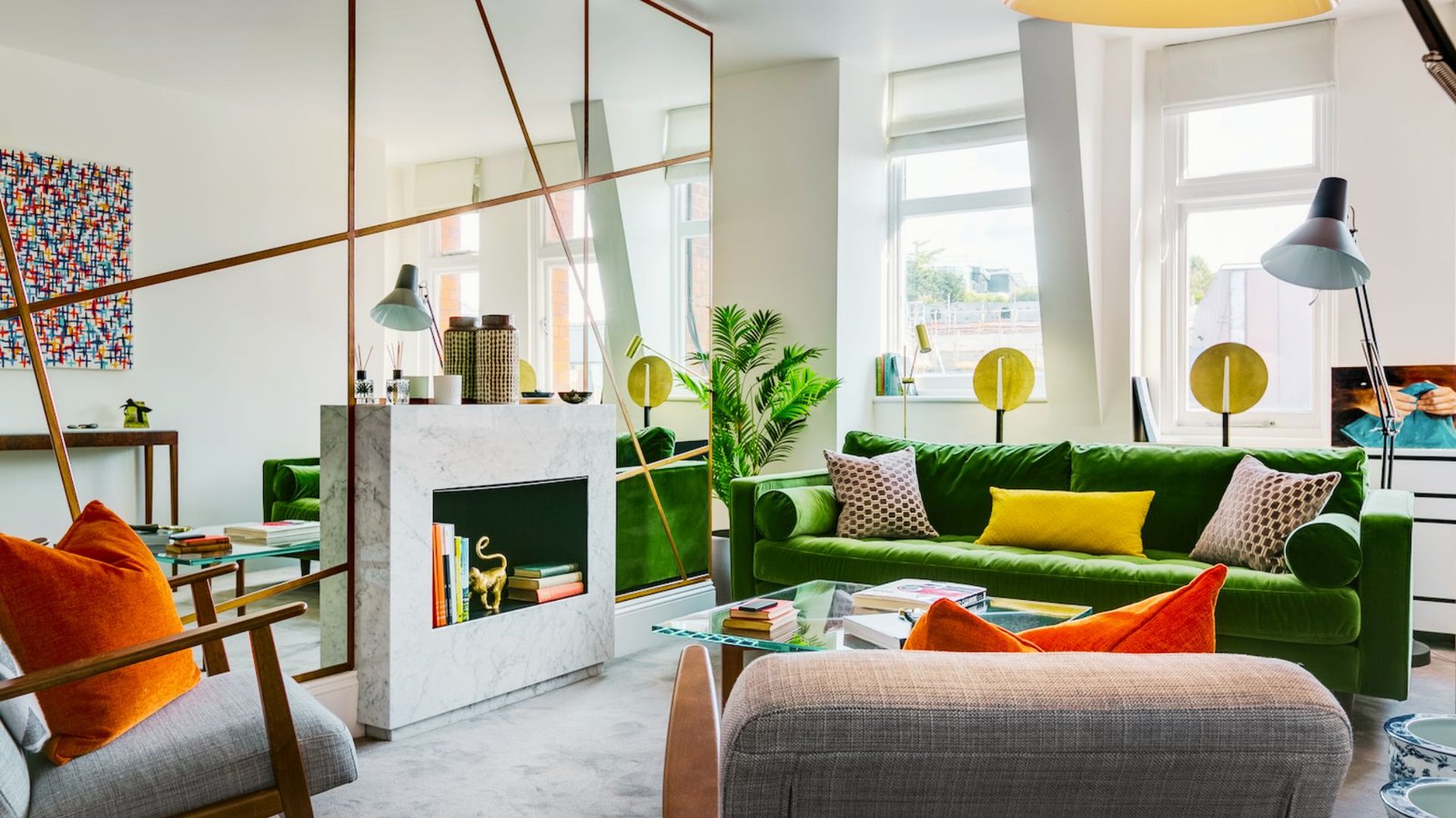 Mirror placed on a side wall reflecting natural light in a living room.