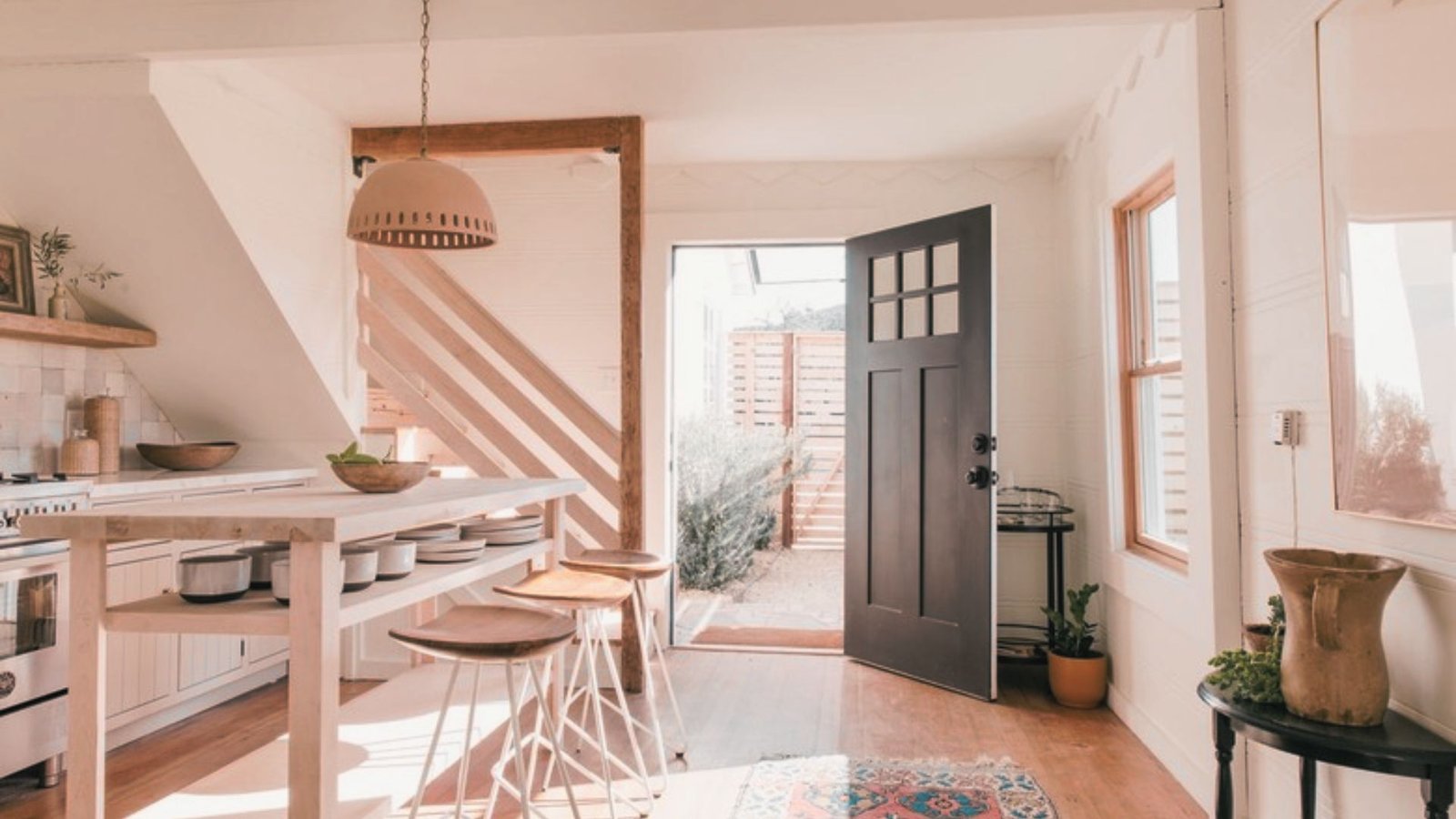 Minimal farmhouse board and batten entryway with clean decor.