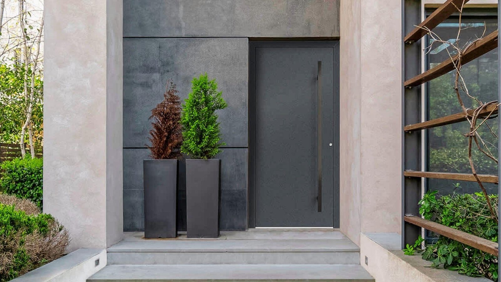 eek modern gray steel exterior door with long pull handle offering superior insulation for cold weather homes